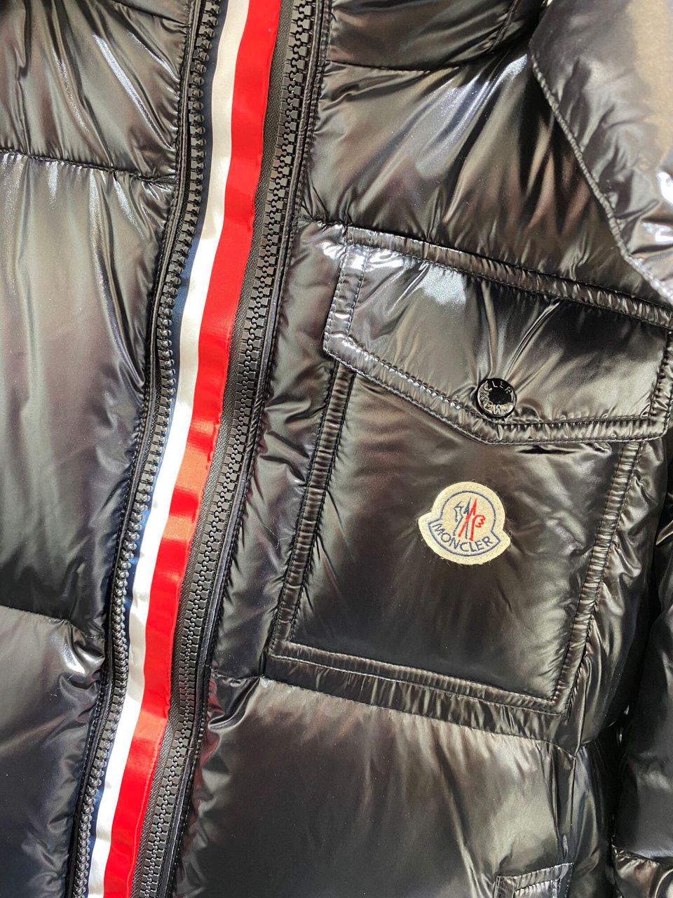Moncler Men's Black Puffer Jacket with Red Stripes - Stylish Insulated Outerwear for Winter